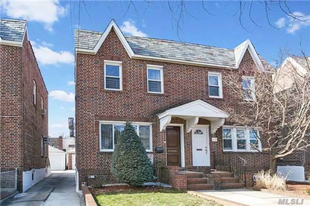 Ultra Mint Diamond Condition In Great Location.Closed To Lirr, Supermarkets, Bus To 7 Train, Sd#26, Ps159, Is25.Custom Mirrored Closets, Huge Skylights.1/F Living Rm, Dining Rm, Fp With Mahogany Cabinet, Hi Lats, Eat In Kitchen With New Gas Stove & Stainless Steel Appliances, Sub-Zero Refrigerator.Gleaming Hardwood Floors, Crown Moldings.Finished Basement Full Outside Entry.