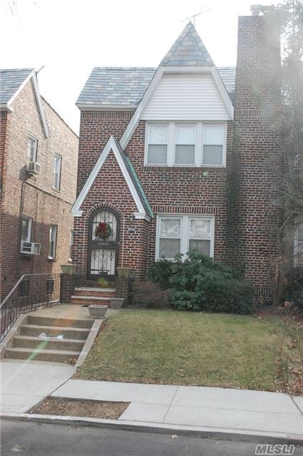 1 Family Semi-Detatched 3 Bedroom Brick On A Quiet Tree Lined Street In Rego Park , Has Wood Floors , Garage And Yard, New Roof
