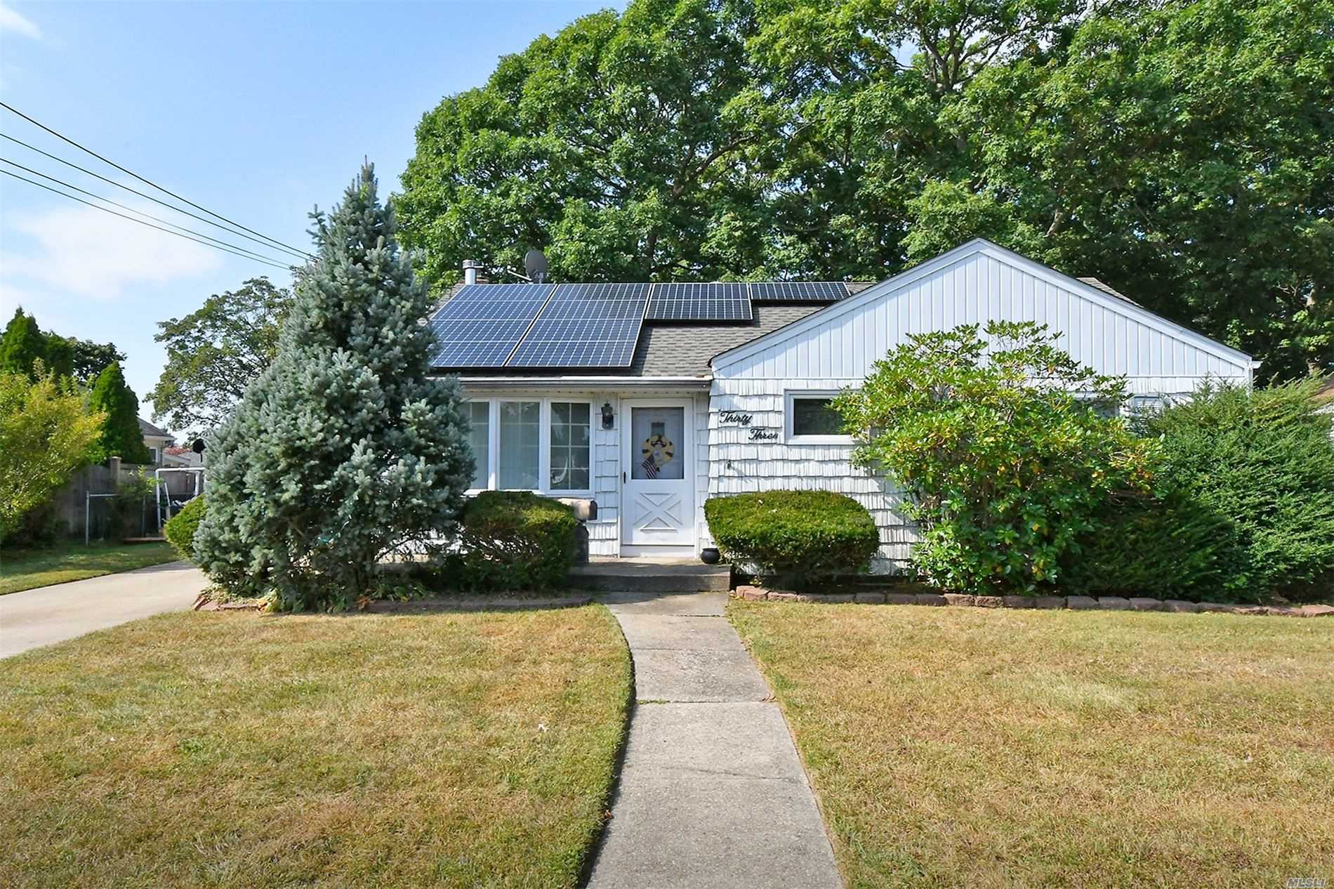 Great Ranch In Farmingdale w/ Huge Yard! Big Unfinished Basement, Backyard Access From Kitchen w/ Rear Wooden Deck, Detached Garage, Big Kitchen w/ Tons Of Potential! Updated Roof, Windows & Solar Panels, Updated Windows, Wood Burning Stove,  Mid Block Location! Don&rsquo;t Miss Out Won&rsquo;t Last!