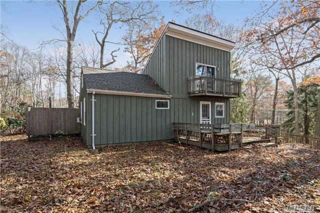 Enchanted 2 Bedroom Cottage On A Beautiful Wooded Acre Lot. Located In The Tranquil Beach Community Of Paradise Shores . Large Entertaining Lr W/Fp, Deeded Beach Rights, Close To North Fork Award Winning Vineyards, Renowned Restaurants And Much More!