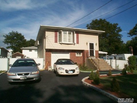 Vaulted Ceiling In Living Room W/Stationary Skylights, Garage Door Opener, New Heating/Hw Heater, Ceramic /Hardwood Floors.