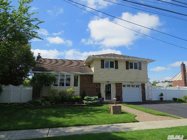 Mint Brick Split,  3 Bedrooms,  2.5 Baths,  Formal Dining Room,  Updated Kitchen And Baths. Beautiful,  Large Rear Yard With Deck,  Patio,  Rollout Awning And Pvc Fencing. New Vinyl Siding And Soffits,  Updated Windows And Roof. 80 X 100 Lot! 1 Car Garage And Blacktop Driveway.