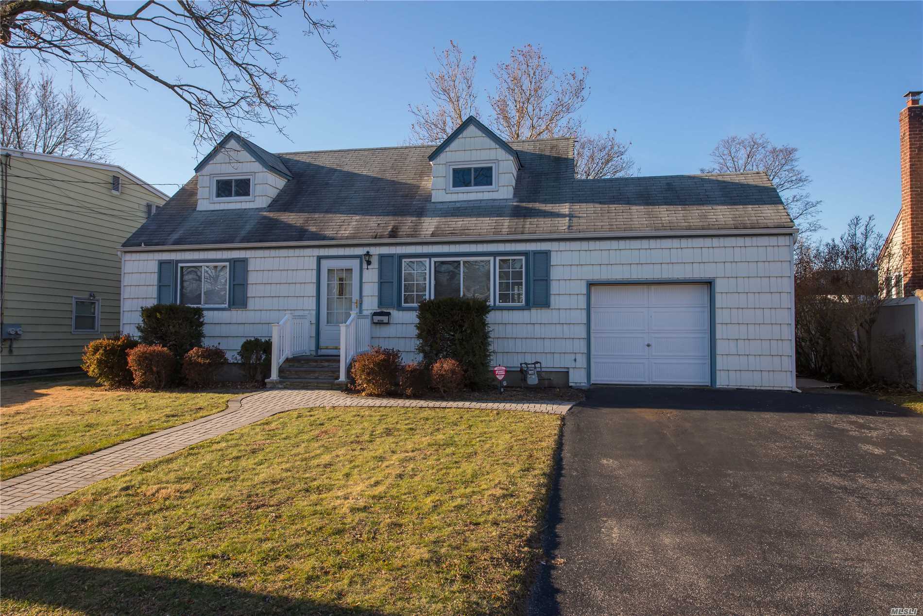 Cute & Clean As Can Be!! 4 Bedroom Cape Cod In Move In Condition W/ Super L-O-W Taxes!