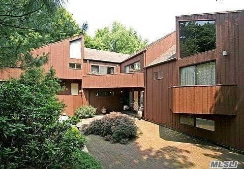 Kings Point Contemporary Overlooking Manhasset Bay With Wonderful Winter Water Views. One Acre Property With Wrap Around Deck And Pool. Spacious Interiors, Soaring Ceilings & Skylights. Living Room, Dining, Den, Eik, Fireplace, His & Hers Bathrooms.  (Needs Work And Updating)