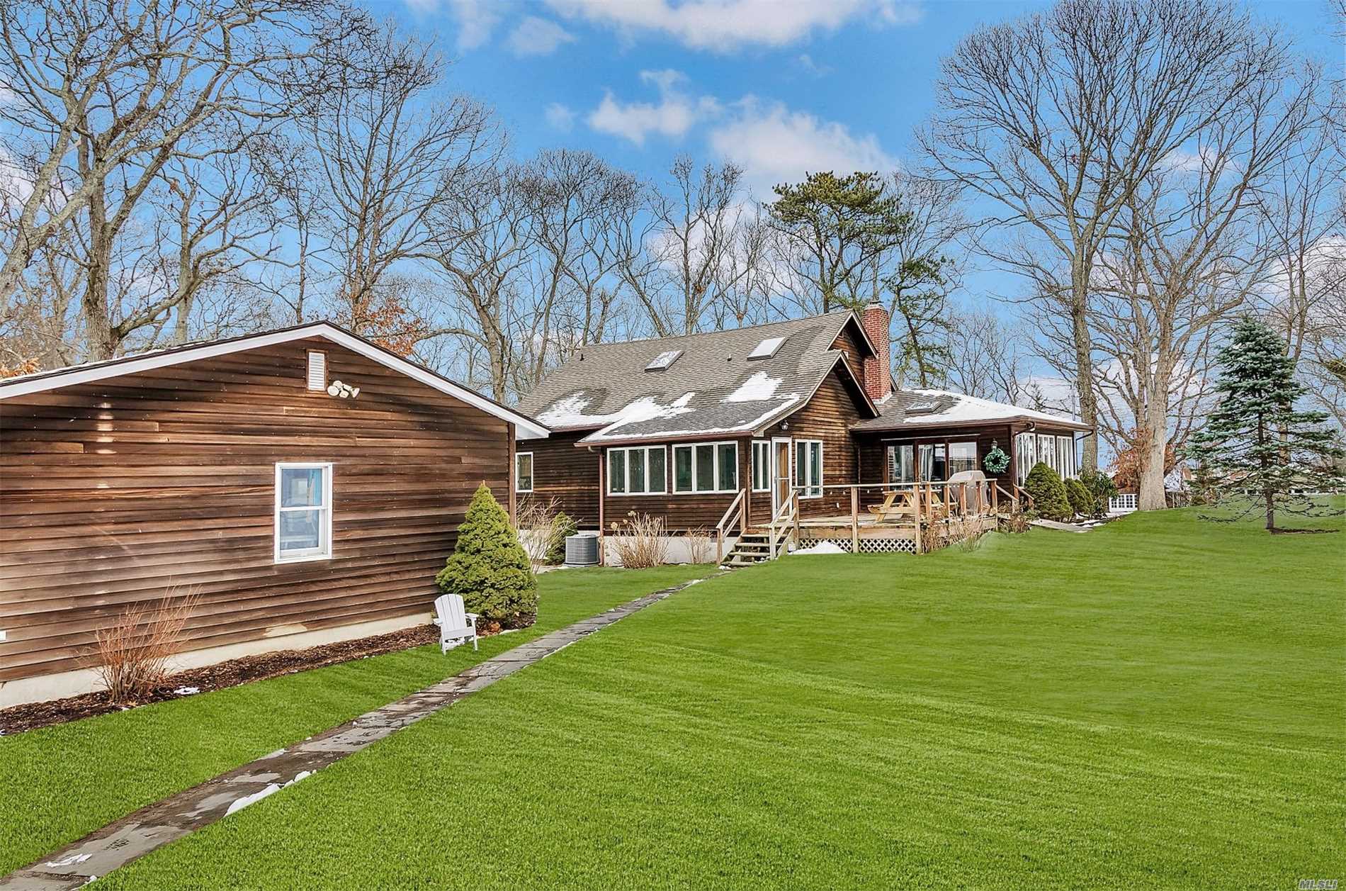 This 5 Bedroom Classic Beach Style Home Has Everything You Imagine A Beach House Should - And The Perfect North Fork Location! Professionally Updated And Lovingly Maintained; Presented And Equipped To A High Standard. Three Properties Away From The Gorgeous, Private Fleets Neck Assoc. Bay Beach. Centrally Located.