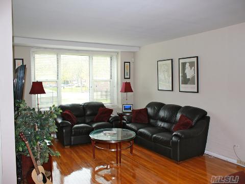 Gorgeous 1,100 Sq. Ft. 2 Bedroom Boasting 'Gleaming' Hardwood Floors ~ Large Eat In Kitchen ~ Huge Livingroom ~ Separate Dining Area ~ 3 Zone Central Air Conditioning ~ Allowed To Have Washer/Dryer ~ Reserved Parking Spot Included ~ Express Bus To Nyc Right Outside ~ Schools & Bay Terrace Shopping Mall 2 Blocks Away ~ No Flip Tax (100 % Equity ) ~ Must See !!!