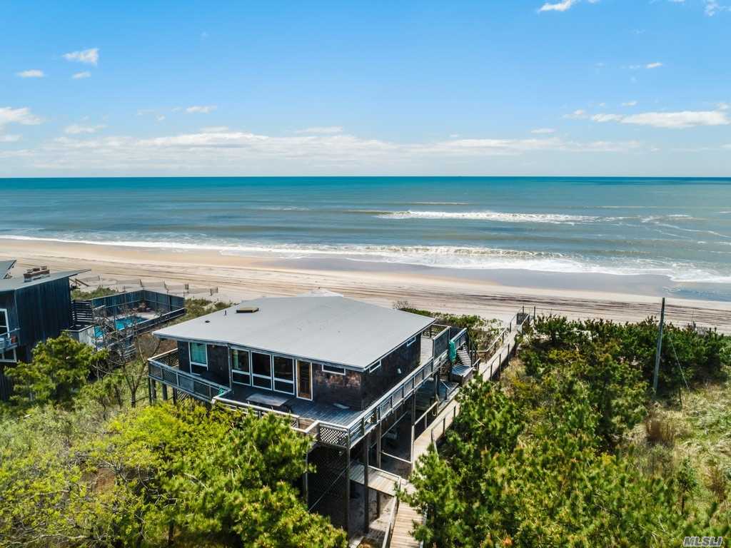 Think Summer! Private Davis Park oceanfront retreat with gorgeous ocean views - higher elevation allows for bay views too. Completely remodeled interior: new kitchen, baths, walls, master suite, and exterior: new roof & siding. The desirable open layout can accommodate large crowd, slider to deck for al-fresco dining, entertaining & spectacular sunsets, spectacular outdoor shower. One house away from public beach access.