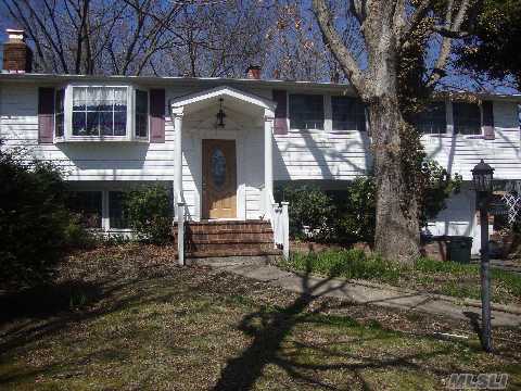 Beautiful 5 Bedroom Hi Ranch In Great Location! New Expanded Custom Kitchen With Stainless Steel Appliances. Wood Floors. Skylights. New Bathroom. Master Bedroom With French Doors Leading To Large Deck. Den With A Fireplace. New Front Door. Situated On A Private Wooded .35 Acre