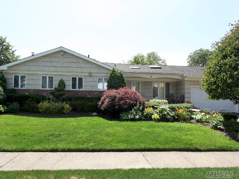 Sought After Huge Ranch In Jericho W 4 Bdr, 2.5 Bth. This Home Boasts Vaulted Eik W/ Skylight & Vaulted Den With Wood Burning Fireplace. A Laundry Room On Same Level Makes For Easy Living. Master Bd W Built-Ins, Adds Extra Closet Space. Cac 5 Skylights. Sprinklers, Professional Landscaping, Pavers Are Just Some Of The Extras. 