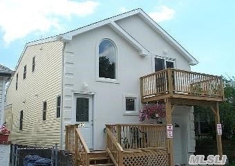 Lower Level Of House Has Been Gutted Due To Sandy.Upper Level Is Intact -Needs Some Updating