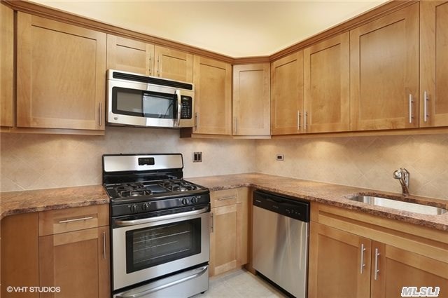 No Board Approval Required!! Grab This Stunning Custom Renovated Two Bedroom Beauty! Gorgeous Kitchen Featuring Custom Cabinet Lighting, Open Layout, Granite Counter Tops, Stainless Steel Appliances, Amazing Closet Space, Hardwood Floors, L-Shaped Living Room Dining Combination. Ps 196.