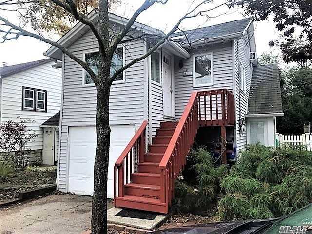 Wonderful Expanded Ranch 2Br 1 Bth With Loft --close To All --walk To Train & Stores !! Great Location !!! Full Basement With Own Seperate Entrance And Oversized Garage.Cathedral Ceilings, Gas Heat, 4 Skylights , Pergo Type Wood And Ceramic Tile Flooring .Must See !
