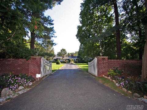 Gated Entry & Stone Walls Surround This Wonderfully Charming Ranch In Jericho Sd. Lots Of 'New'. Fabulous Property, Magnificent Plantings, Patios & Inground Pool. Low Taxes. Best Price In Brookville.  Jericho School District For Designers Own Showcase With Lots Of Flair And Luxury And Spectacular Property! 