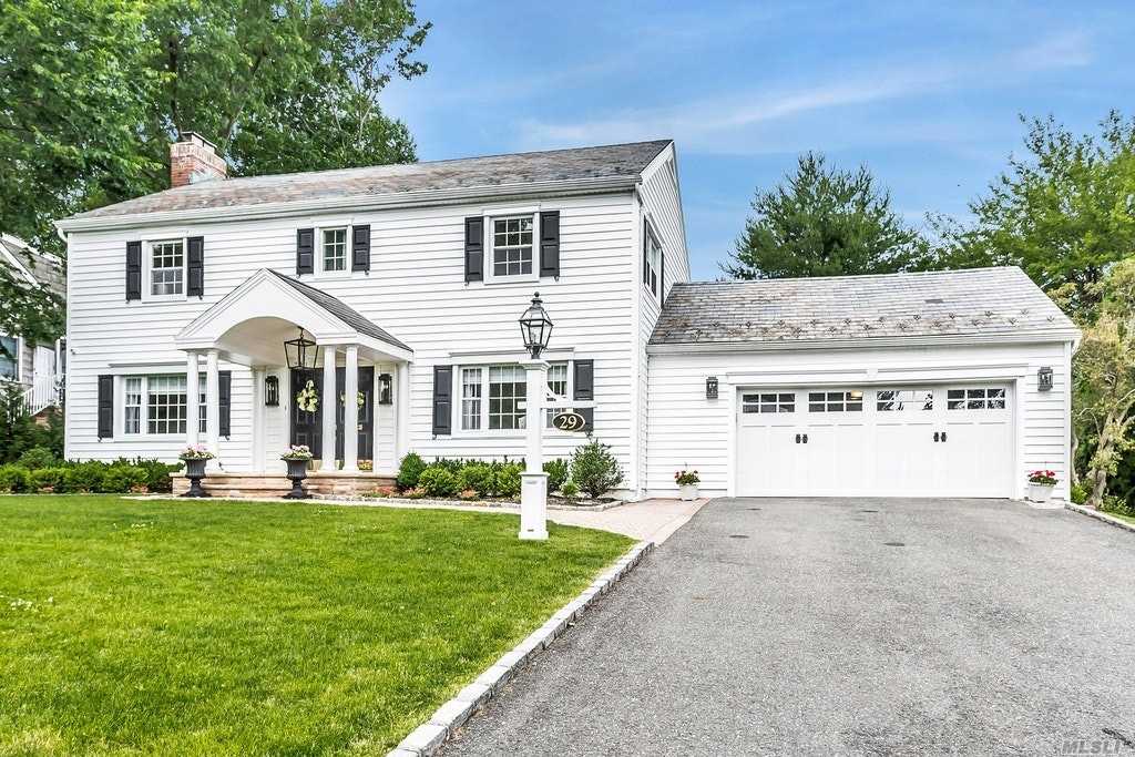 Classic Turn Key Center Hall Colonial, Recently Renovated With Custom Finishes Throughout. Beautiful Lot On Quiet, Private, Street In Sought After Section Of Munsey Park. Close To Schools, Town And Shopping.