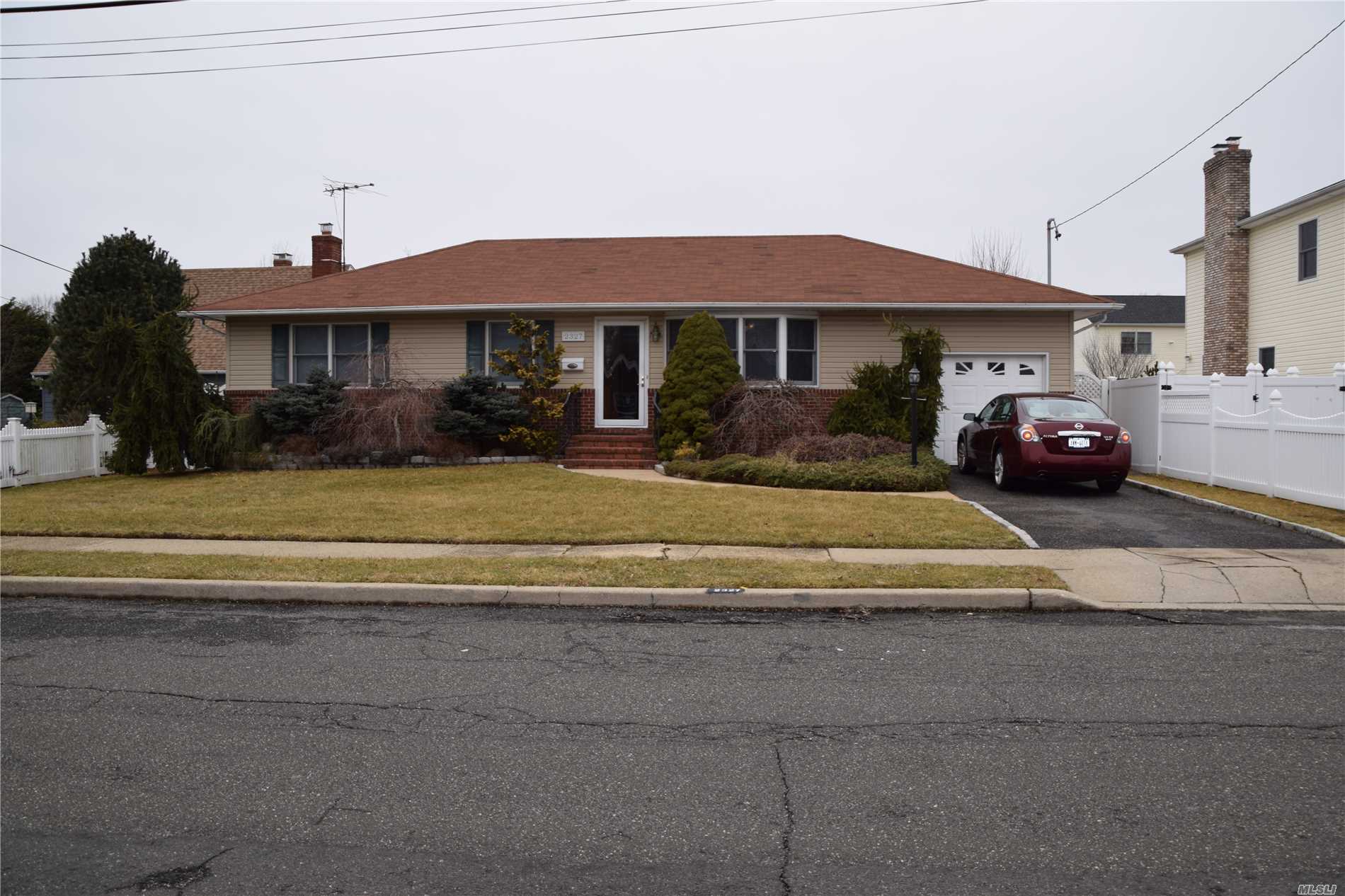 There&rsquo;s Not Much To Do But Move Right Into This Custom Mid Block Ranch ! This Home Comes With Park-Like Oversized Landscaped Property, 8 Year Young Vinyl Siding, Cabinet Lined Oak Kitchen With New Stainless Steel Appls & Gas Cooking, Formal Dining Rm With Parquet Flr, Full Finished Spacious Basement With An Outside Entrance & Cedar Closet, Master Bedroom With It&rsquo;s Own Bath & Walk-In Closet, Detached Garage With Ee, Inground Sprinlers, 5 Year Young Pvc Fence & More ! Let&rsquo;s Get In For Spring !