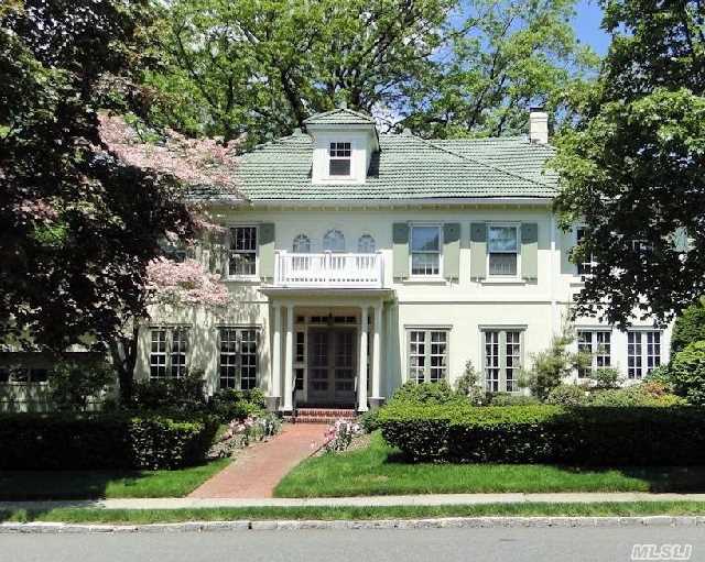 Elegant Center Hall Colonial With Large Sunny Rooms Ready For Your Imprint. Large Liv Rm W/Fireplace,  Formal Dining Room,  Den And Eat-In Kitchen On Ground Floor,  Master Br W/ Fpl,  Master Bath,  Library,  2 Bedrooms And Full Bath On 2nd Floor,  2 Additional Bedrooms And 3rd Bath On Top Floor. Central A/C,  Gas Heat,  Slate Patio.