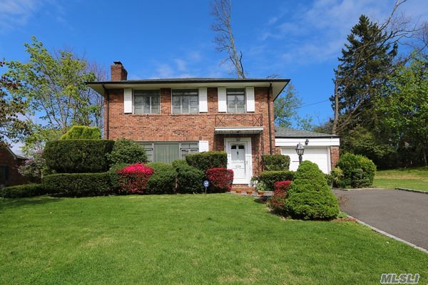 Beautiful Brick Colonial In The Village Of Plandome Heights. First Floor Features Lr With Fireplace, Dr, Updated Kitchen, Family Rm & Powder Room. Second Floor Features 3 Bedrooms & Full Bath. Full Basement With Laundry. Irregular Lot 89 X 56 X 151 X 145. New Roof. A Must See. Mid Block Location. Walk To Town & Lirr.