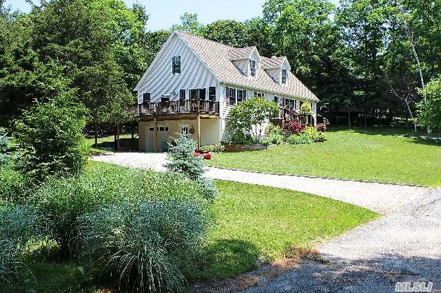 Set Atop A Hill On Hogs Neck,  This Home Is Perfectly Suited For Entertaining Guests Or Escaping The Daily Grind. Close To Beautiful Cedar Bay Beach And Quaint Downtown Southold. Enjoy The Fireplace In Winter Or Tan On The Deck In The Summer.