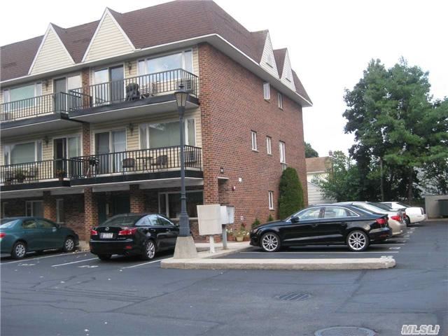 Sale May Be Subject To Term & Conditions Of An Offering Plan.Beautiful Main Fl (No Steps) - Largest In Complex -2 Apartments Combined 1360Sqft.Corner Unit Semi-Detached, 3 Exposures, Window In Kitchen, Laundry In Unit, 2 Large Locked Storage Rooms In Basement, 2 Parking Spots In Front Of Unit, Washer/Dryer In Unit. Walk To Lirr. Award Winnning School District #20 Lynbrook