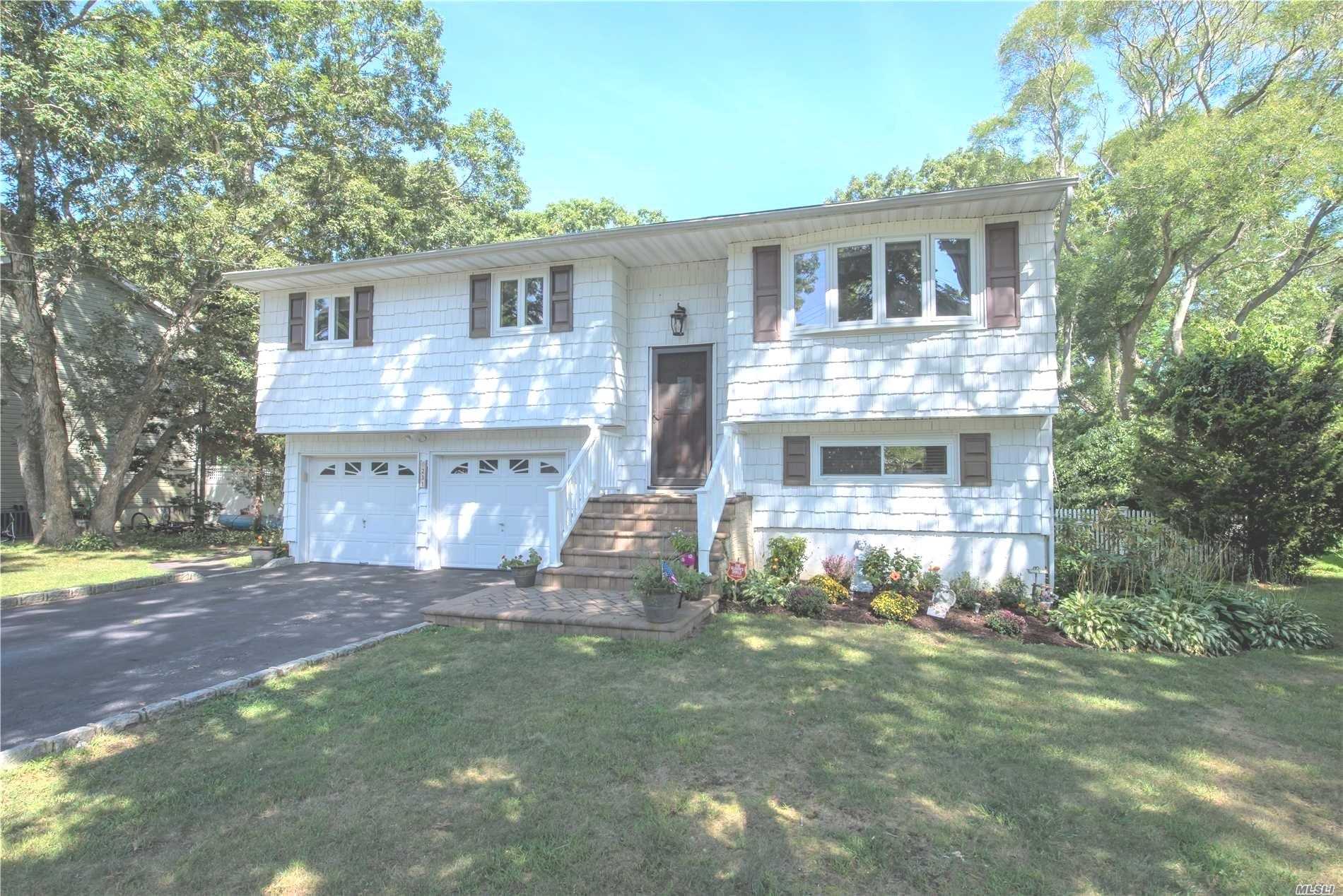 Fabulous Expanded High Ranch Featuring New Kitchen W/Quartz Counters And High End Appliances. Open Floor Plan To Fdr W/Fab Upper Extension Overlooking Parklike Property. Oak Floors, New Bath, New Ag Mineralized Pool (A Gift) Move In Read...Great Den On Upper Level. Easy Mother /Daughter