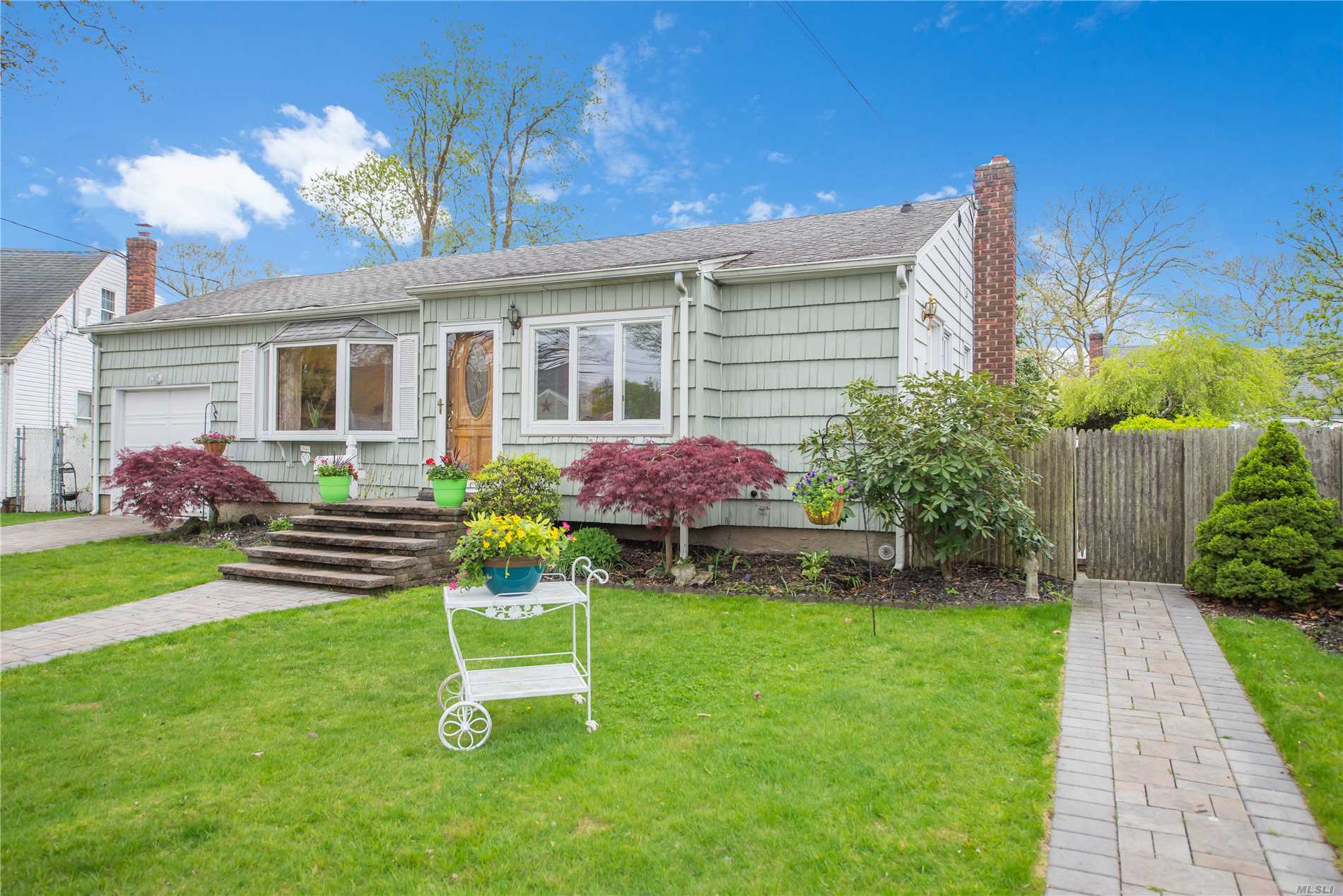 Adorable & Immaculate Wideline Ranch On Private Cul-de-Sac. Countless Updates & In Move In Condition. Enjoy Your Morning Coffee In The Glass Sunroom & Store All Of Your Junk In The Full Basement. Certified Energy Efficient Home Improvements Under The Long Island Green Homes Program.