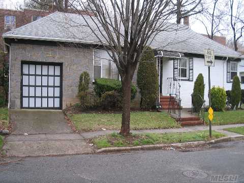 Well Maintained Home Close To Express Bus, Downtown Flushing Bus, And Shopping. Extended Garage Has Entrance To Kitchen. Central A/C .In-Ground Sprinklers. Gas Bbq In Backyard.