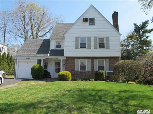 Saddle Rock Estates Wonder Colonial. Formal Lr With Fireplace, Arched Entry To Formal Dr, Newly Renovated Eik, Hardwood Floors Throughout, Moldings & Chair Rail, Gas Conversion, Generator, New Roof. 3rd Floor Bonus Room. Conveniently Located On Quiet Block.