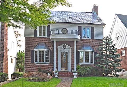 Gorgeous Home In Prime Area Of Beechhurst, Robinswood.  Colonial With Tudor-Like Details: 2 Fireplaces, Stained Glass Windows, Large Extension/Den With Fireplace, Classic Details, All Updated, Brand New Eat In Kitchen On First Floor And Full Kitchen In Basement.  New Windows, Alarmed, New Gas Heat And Hot Water Heater.   