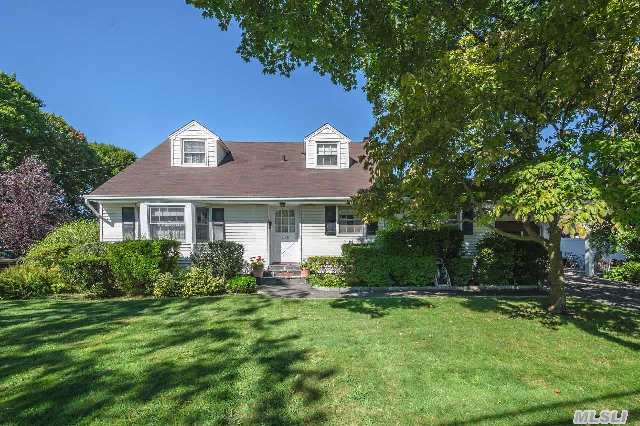 Quiet Street,  Meticulously Maintained,  Dormered Cape With A Colonial Feel. 1856 Square Feet,  Unique Floor Plan. Hw Flrs Throughout. Wood Burning Fireplace In Over-Sized Living Room. Oak Cabinets In Eik With Lots Of Counter-Space. Fdr With Slate Flooring And Entrance To 1.5 Garage. Steel I Beam Supports In Basement . Central Blvd School.  Gas On Street.