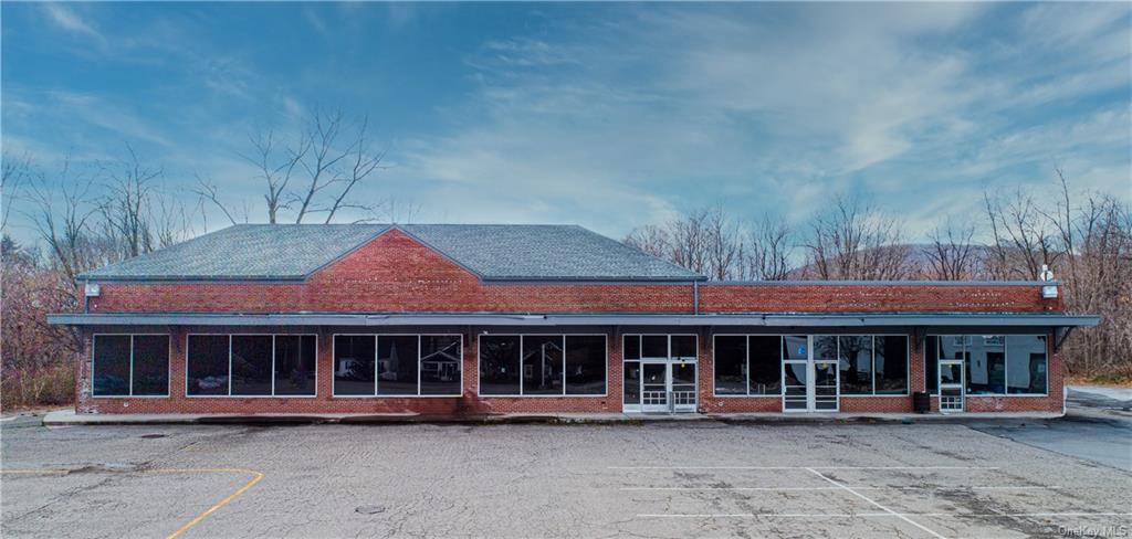**16,000 SF commercial space available for renovation, build-out that the landlord will divide**.