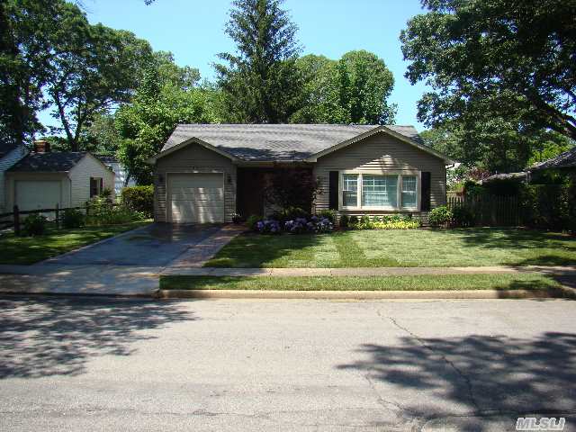 Mint Condition Spacious Ranch With Hardwood Floors Throughout.  Move In Condition.  New Roof,  Irrigation,  Cac,  Siding,  And Interior!  Huge Stand Up Full Length Attic.  Professionally Landscaped - Great Curb Appeal In Beautiful Massapequa Woods.