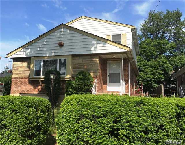 This Brick & Frame Home Was Expanded From A Hi-Ranch To Create A 4/5 Bedroom, 3.5 Bath Colonial With Large Rooms! Ideal For The Large, Or Growing Family, This Spacious Home Is Located In Fresh Meadows, Zoned For School District #26 And Close To All!