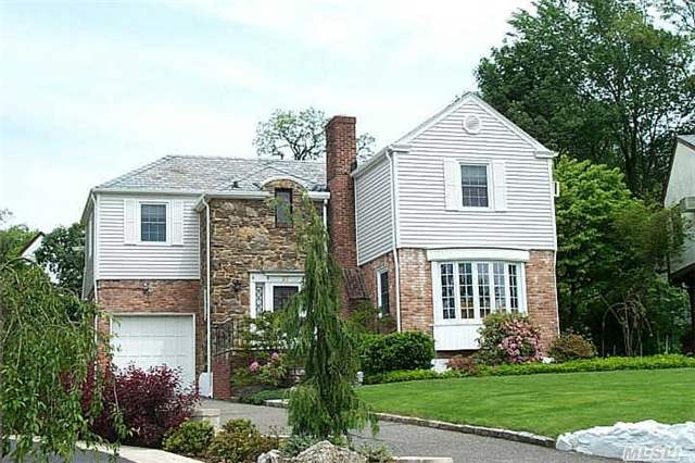 Brick Colonial With 3 Bedrooms, 2.5 Baths, Large Living Room With Fireplace, Formal Dining Room, Eat In Kit, Family Room With Fireplace, Generous Master Bedroom Suite With Therapeutic Air Tub, Beautiful Property, .18 Acre, Large Yard, Full Basement And Attic, Near Lirr, Town And School.