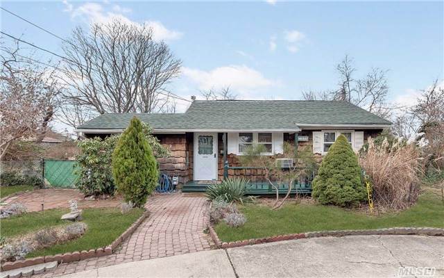Wideline Ranch On An Oversized Corner Lot W/Circular Driveway. This Home Features A Large Lr W/Wood Burning Fireplace, H/W Floors Throughout. Roof Was Done In 2007. Best Buy In Bay Shore Schools! Taxes W/Star $6931.40