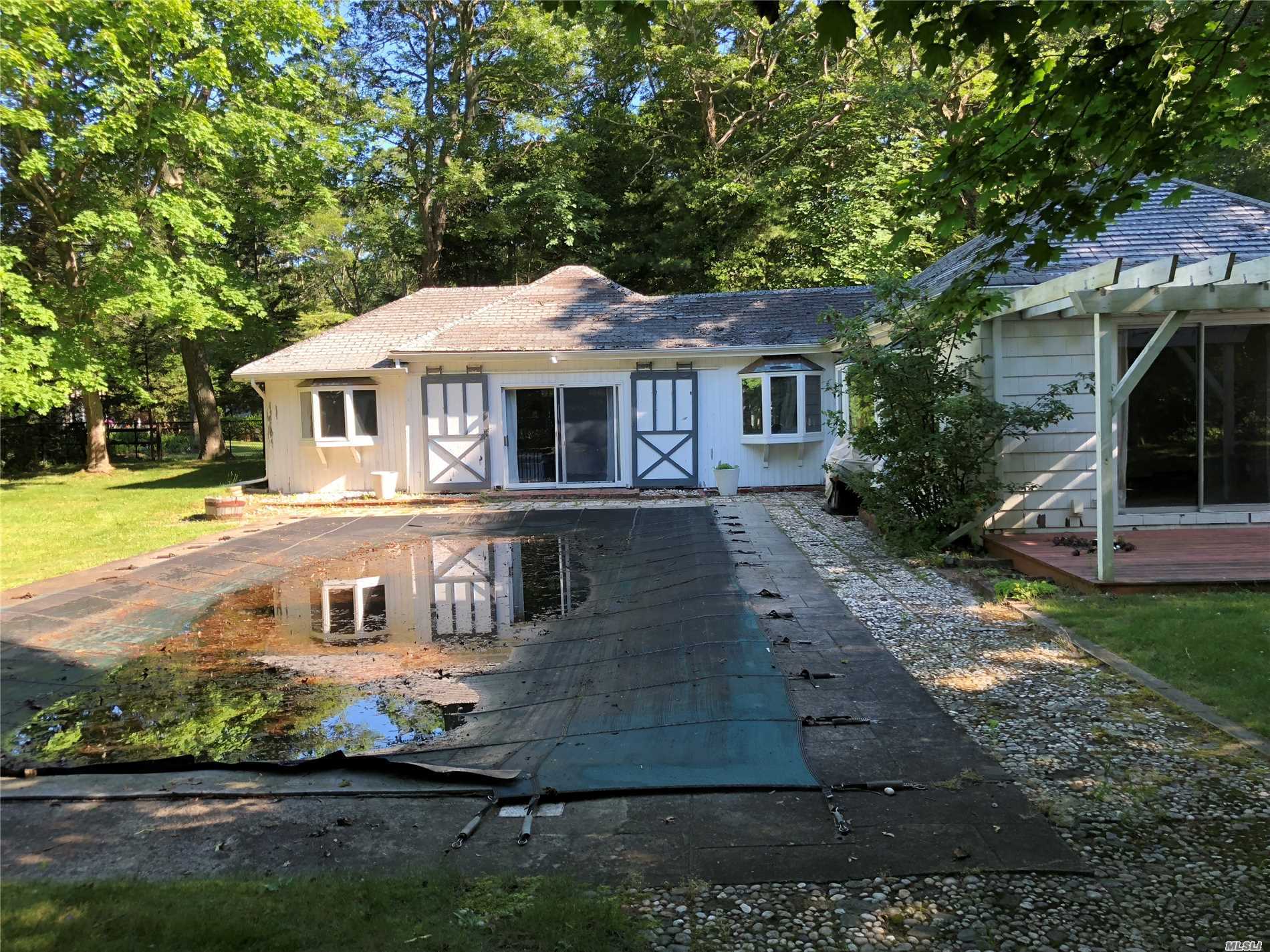 This Photo Is The Pool House Which Has 1400 Sq Ft. The Main House Is The Second Photo Which Has 2400.The Pool Is 20 X 40. This Property Is 0.85 Of An Acre In A Beautiful Secluded Location Near Np Private Beaches.. The Main House Is In Need Of Structural Repairs & Renovations. The Pool House Is Also In Need Of Renovations. We Have C Of O&rsquo;s For Both Structures . This Is The Least Expensive House For Sale On Np. This Is A Great Opportunity To Customize These 2 Structures To Suit Your Needs.