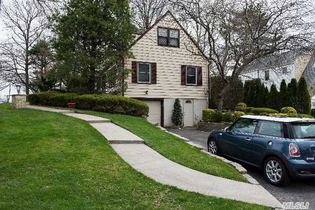 Beautiful And Well-Maintained Home  On Sprawling Corner Property In Herricks School District! This Home Features A Large Deck,  Finished Basement,  Irrigation System,  Large Master Bedroom And Much Much More.  Move In Ready