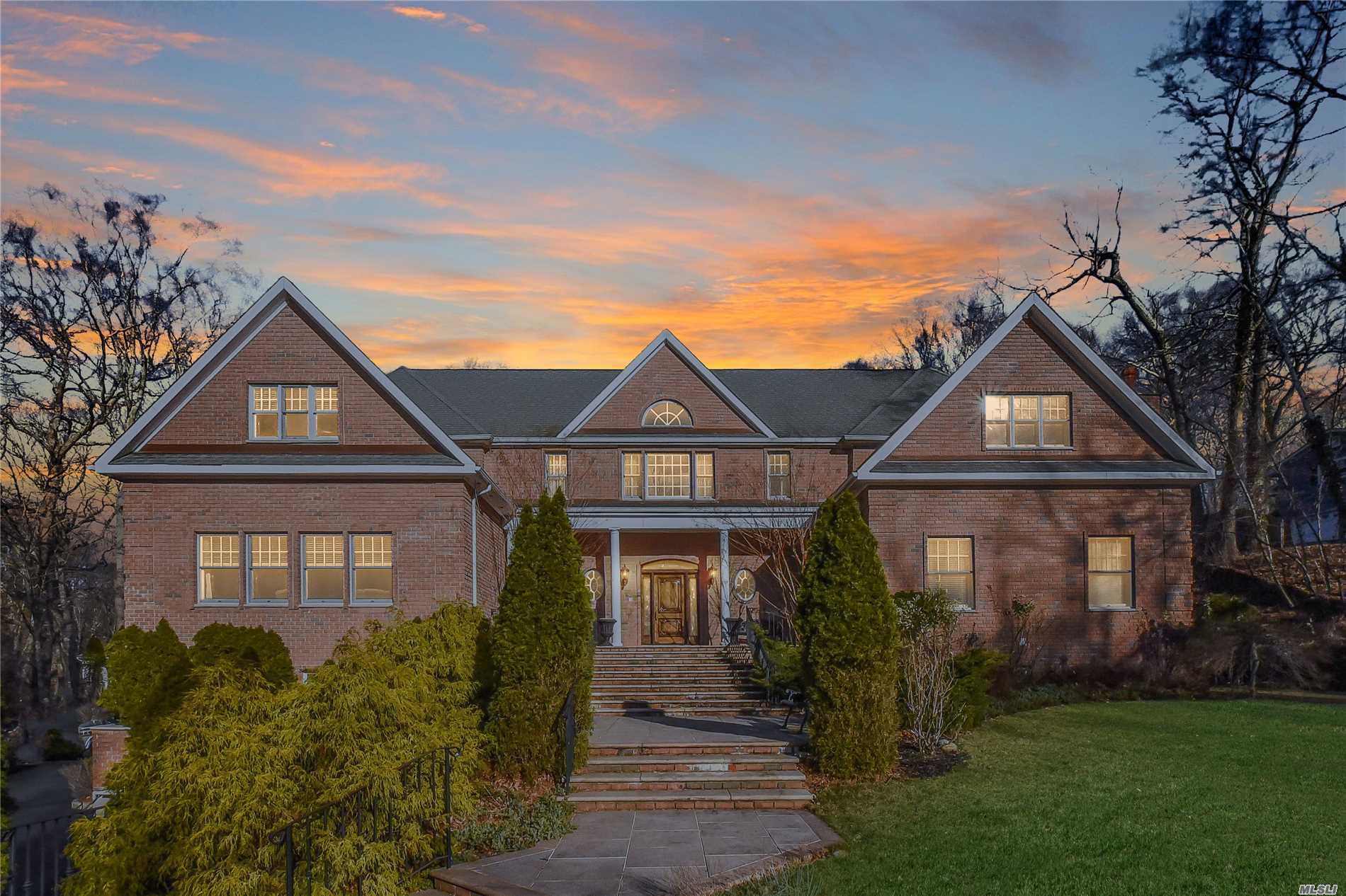 This 5800 Sf All Brick Designer Showplace Is Set Upon 2 Acres Across From Stony Brook Harbor. Winter Water Views Can Be Enjoyed Throughout This Beauty. Among Its Obvious Custom Design, You Will Find Attention To Detail At Every Turn. Come Inside And Experience Its 10Ft Ceilings, Mahogany Flrs, Gourmet Kit W/Granite Countertops, Arched Doorways, 1st Fl Master Suite Overlooking Igp And So Much More. Relax By The Fp, Entertain Both Inside & Out. Experience The Luxury That Awaits Within.