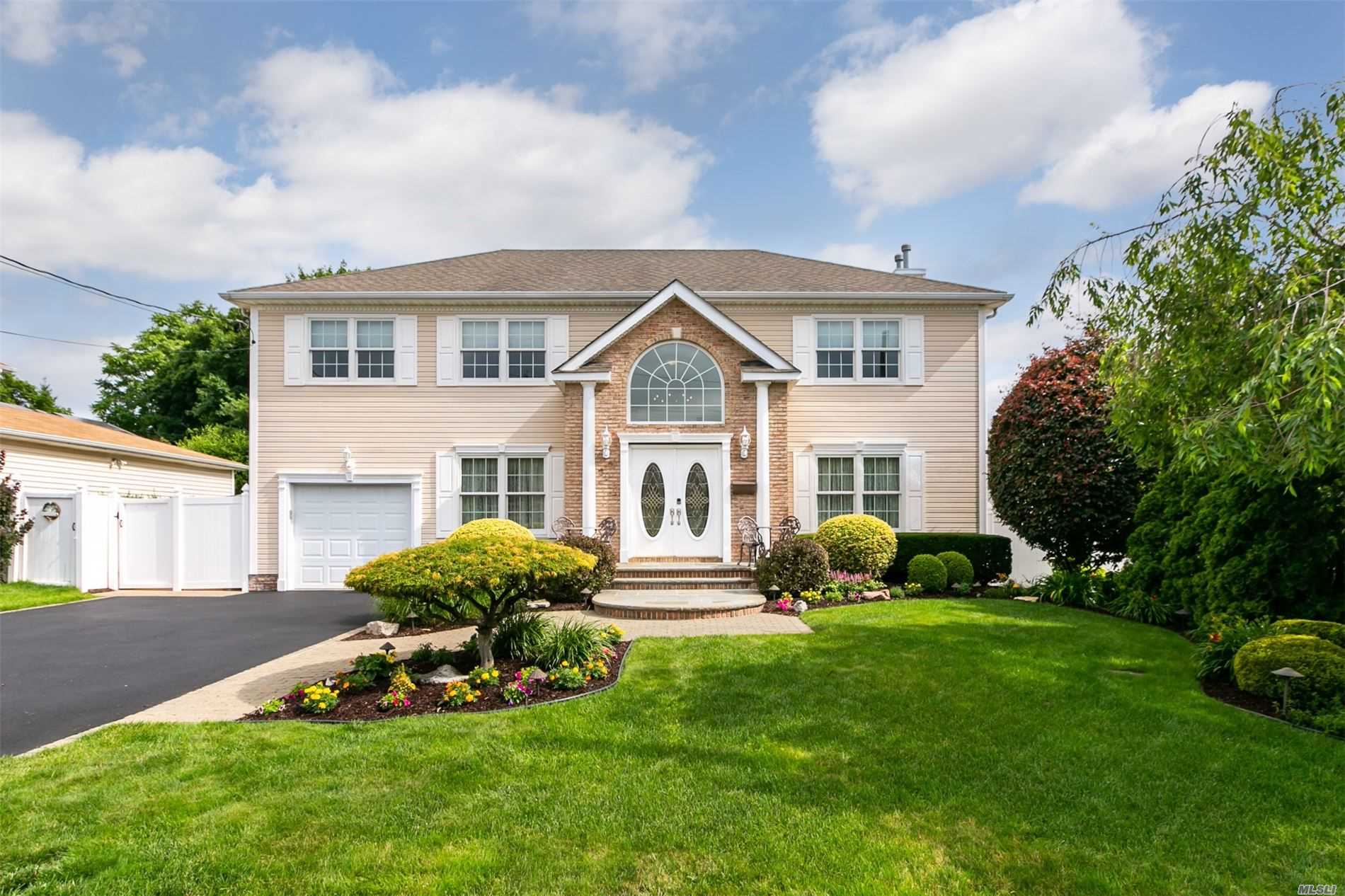 This Stunning, Turn Key Centerhall Colonial Checks Every Box for Move in Ready Buyers! Charm & Elegance Abound From First Steps Into 2 Story Grand Entry! Gleaming Hardwd Flrs! FDR, LR, Den w/Gas Fplce, EIK w/Cherry Cabinets, Granite Counters, Upstairs Expansive Master Suite w/WIC & MBath, 3 Large BRs, Full Bath. Backyard is an Entertainers Dream w/IG Kidney Shape Pool w/Waterfall! Mature Plantings for Privacy and Large Paver Patio! Updated Anderson Windows, IGS, Gas Heating, CAC, Low Taxes!