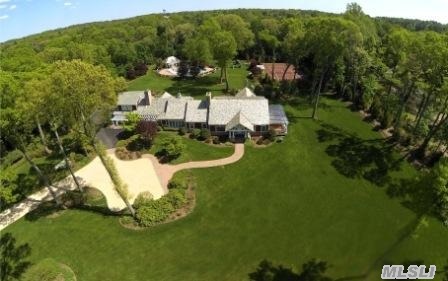 Builders' Own Mag.Gated Farm Ranch On 3.29Acres. Grand Chefs Custom Eik W.Carrara Mbl Countertps.Mstr Ste On Main W.His&Hers Designer Closets+Spa Bth W. Radiant Ht. Surveillance Cameras.Free Form Beach Entry Pool W.Waterfalls +Led Lighting, Red Har Tru Tennis Ct, Pool Hs W. Bdrm, Locker Rm, Kit+W/D. 3 Car Garage. Jericho Sd. Does Not Sit On Or Back Cedar Swamp Rd.