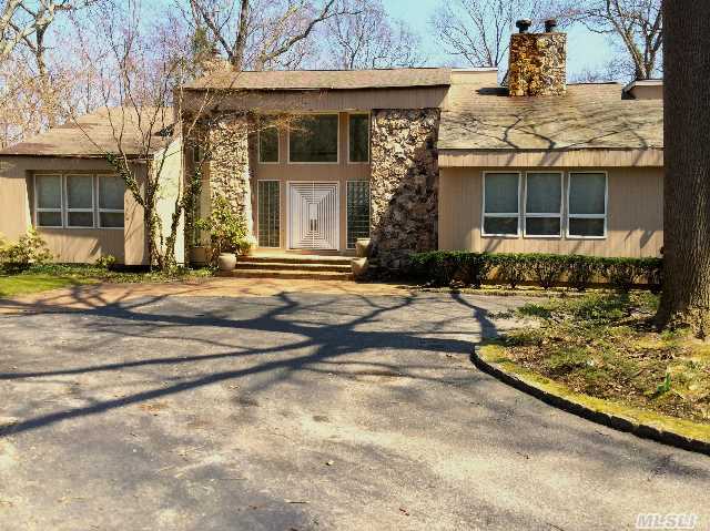 Nestled On 1.91 Private Acres,  This Diamond-In-The-Rough 5, 000 Sf Contemporary Expanded Ranch Offers Wonderful Light,  Space And Flow. Large Principle Rooms. High Ceilings. Master + 3 Family Brs On Main. Br,  Bth + Loft Up. Full,  Unfinished Walk-Out Lower Level. Cv. Ig Heated Gunite Pool. Decking. 3-Car Garage. Beach Rights. Oyster Bay-E. Norwich Schools.