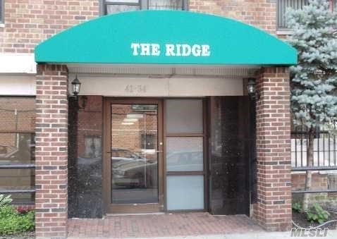 Large 2 Br Apt, Corner Unit, Around 900 Sqft. Flushing Downtown Location!!! Convenient To #7 Train, Lirr, Bus Bank, Supermarkets, Restaurant, Shopping...