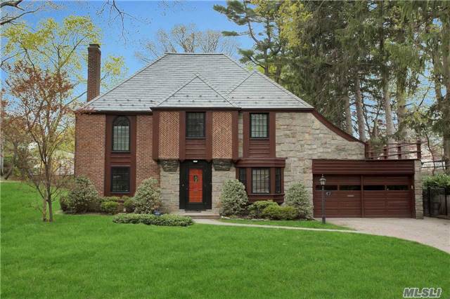 Majestic Brick And Stone Tudor Situated On Approx. .33 Acre At End Of Cul De Sac. Updated Kitchen And Large Principal Rooms For Entertaining. Bedroom Or Office On Main Floor With Full Bath. Master Suite With En Suite Bath And 3 Additional Bedrooms And Renovated Bath. Full Basement And Attic.