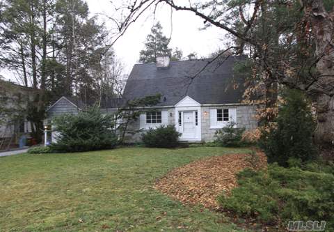 Stone And Shingle Cape 4 Bedrooms And 2 Bath With Wood Floors Throughout.  Eat-In Kitchen, Living Room With Fireplace And Sunroom.  Nice Property With Loads Of Potential In Roslyn Flower Hill.  Highly Sought After Roslyn Schools (Sd#3).  Port Washington Train Sticker Included.  House Being Sold 'As Is.'  Street Is Ridge Drive West