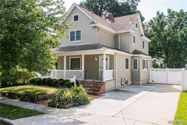 This Charming Colonial Features A Wrap Around Porch, New Hw Heater, New Kitchen &Baths, Tile Floor, New Siding, Windows, Pvc Fencing, Recess Lighting, All New Cement Driveway & Brick Stoop, New Doors, Fully Floored Walk-Up Attic, Gorgeous Parklike Grounds. A Must See, Show & Sell, Shows Beautiful !!