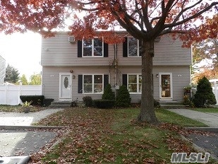 Great Updated Townhouse In Bay Shore Schools- Gorgeous Floors, Finished Basement And Great Taxes Of $6420
