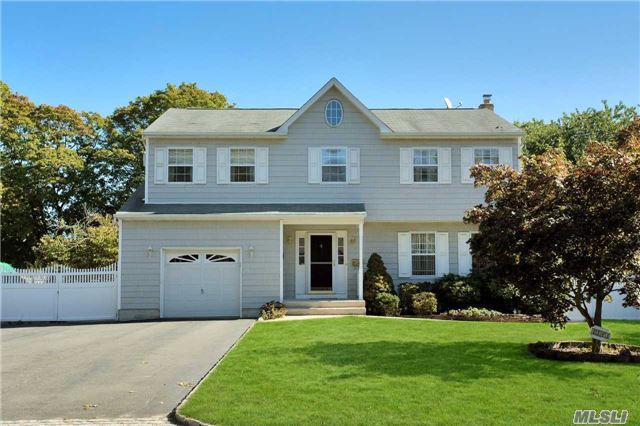 West Islip Schools! Like New, 4 Bdrm, 2.5 Bath Colonial With Open Bright Floor Plan, Spacious Master Suite W/ Full Bath, Central Air Conditioning System, Gas Heat, Full Basement, Wood Floors Thru Out, Large Den W/ Gas Fireplace, Very Private 75X150 Yard, Large Rear Deck & 1 Car Attached Garage