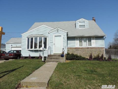 Beautiful Expanded Cape W/Entry Foyer, A Relaxing Livingroom, A Roomy Diningroom & Updated Kitchen, W/ Lots Of Cabinets & Counter Tops. The Rear Offers A Bi-Level Deck, A Large Privately Fenced Yard & A 1.5 Detached Garage W/Expanded Private 6 Car Driveway. Well Sunlit Rooms On The Second Floor W/Updated Bath. Basement Offers Finished Den W/ Bar, Laundry Room, Storage.