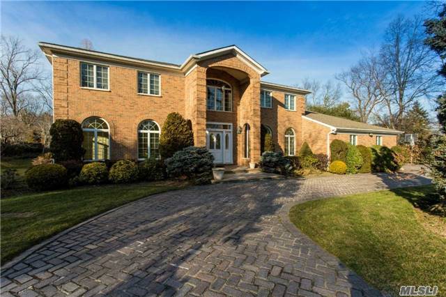 Buiders Own, Solid Brick 5 Br, 6.55 Bth Colonial Majestically Situated On 1+ Acre Of Park-Like Grounds. Over-Sized Two Story Entry Foyer Leads To Grand Entertaining Rms W/Custom Design Moldings & Panelling. Ig Heated Pool W/ Poolhouse. Huge Patio W/Brick Pizza Oven & Built-In Bbq. Fully Fin Bsmt & Generator.