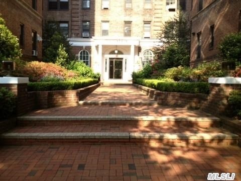 Easy Access 1st Floor Apartment In Prestigious Downtown Great Neck Pre-War Building. Beautiful Western Views Facing The Park. This Unit Features 2 Bedrooms With Original Wood Floors,  High Ceilings,  With Arched Doorways. Updated Kitchen  With Stainless Steel Appliances. Largest Master Bedroom Layout In The Building And It Comes With Parking!! Great Location Near Lirr & Town