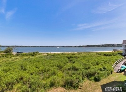 Great Opportunity To Own A Duplex Right On The Bay In Oyster Point With Views Of The Bay. This 2 Bedroom, 2.5 Bath Includes 2 Decks To Enjoy The View From Both Levels, A Private Beach, Pool, Tennis And A Boat Slip That Can Dock Up To A 28Ft. Boat. Walk To Town To Enjoy Everything That Greenport Has To Offer.